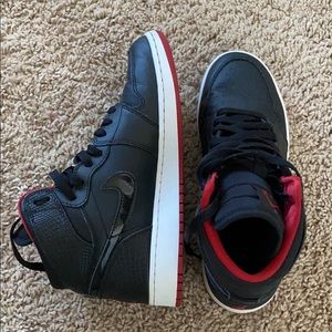 Black and Red Nike 1’s